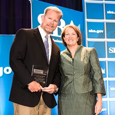 John Stonecipher of Guidance Aviation winning the SBA National Person of the Year award in Washington DC